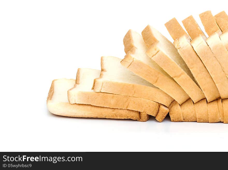 Sliced white bread on white background .