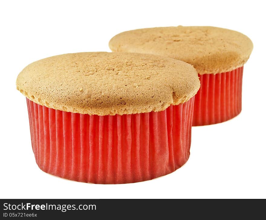 Row of two sponge cake in red paper cup on white background. Row of two sponge cake in red paper cup on white background