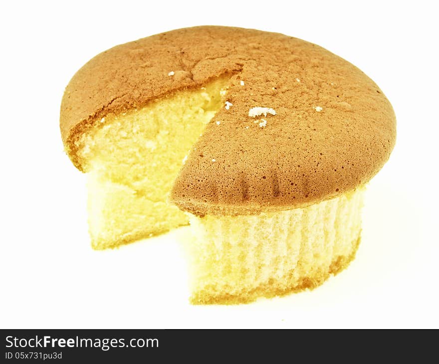 Most of sponge cake after area segment cut on white background