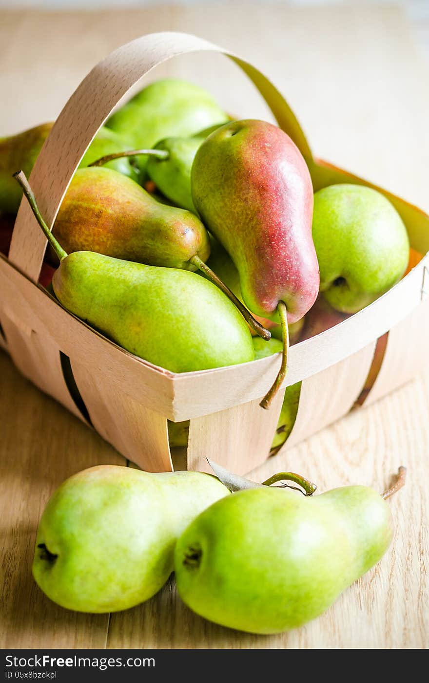 Green pears in the basket