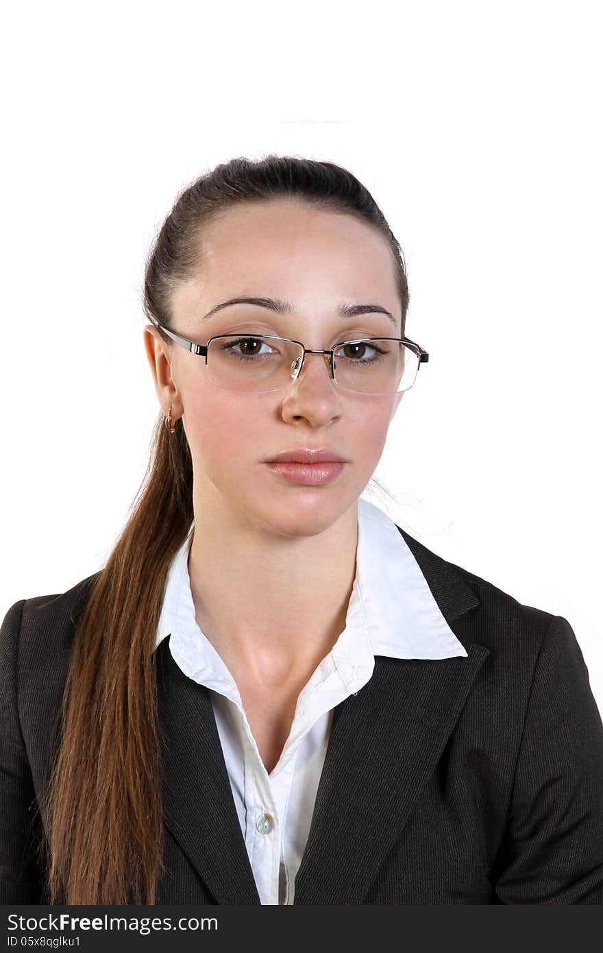 Beautiful young business woman in glasses. White background. Beautiful young business woman in glasses. White background