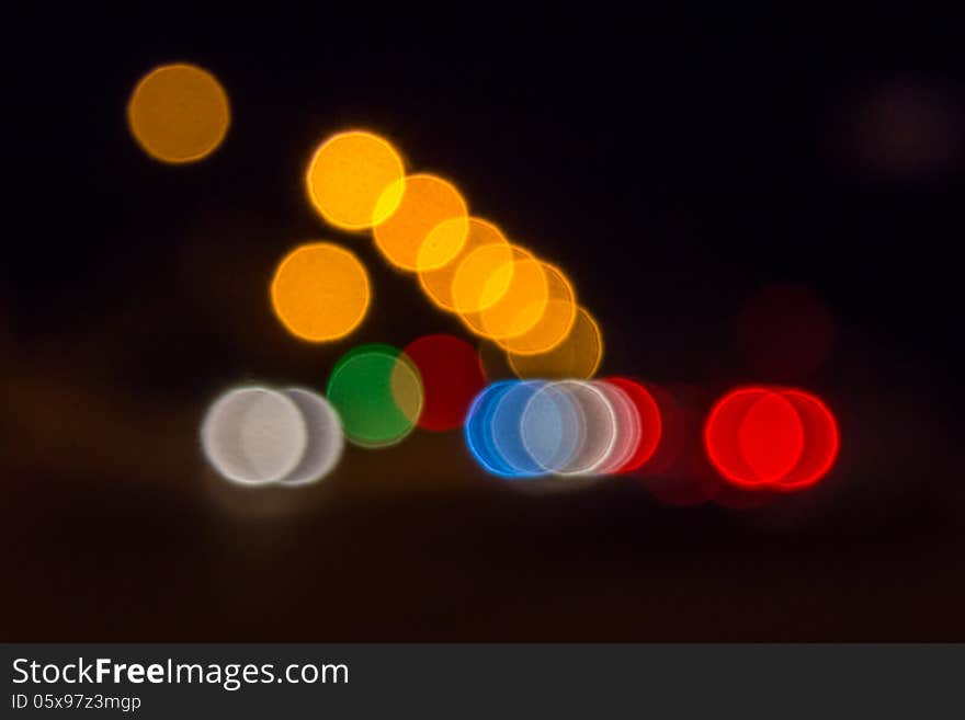Abstract blur of night lights formed a triangle. Abstract blur of night lights formed a triangle