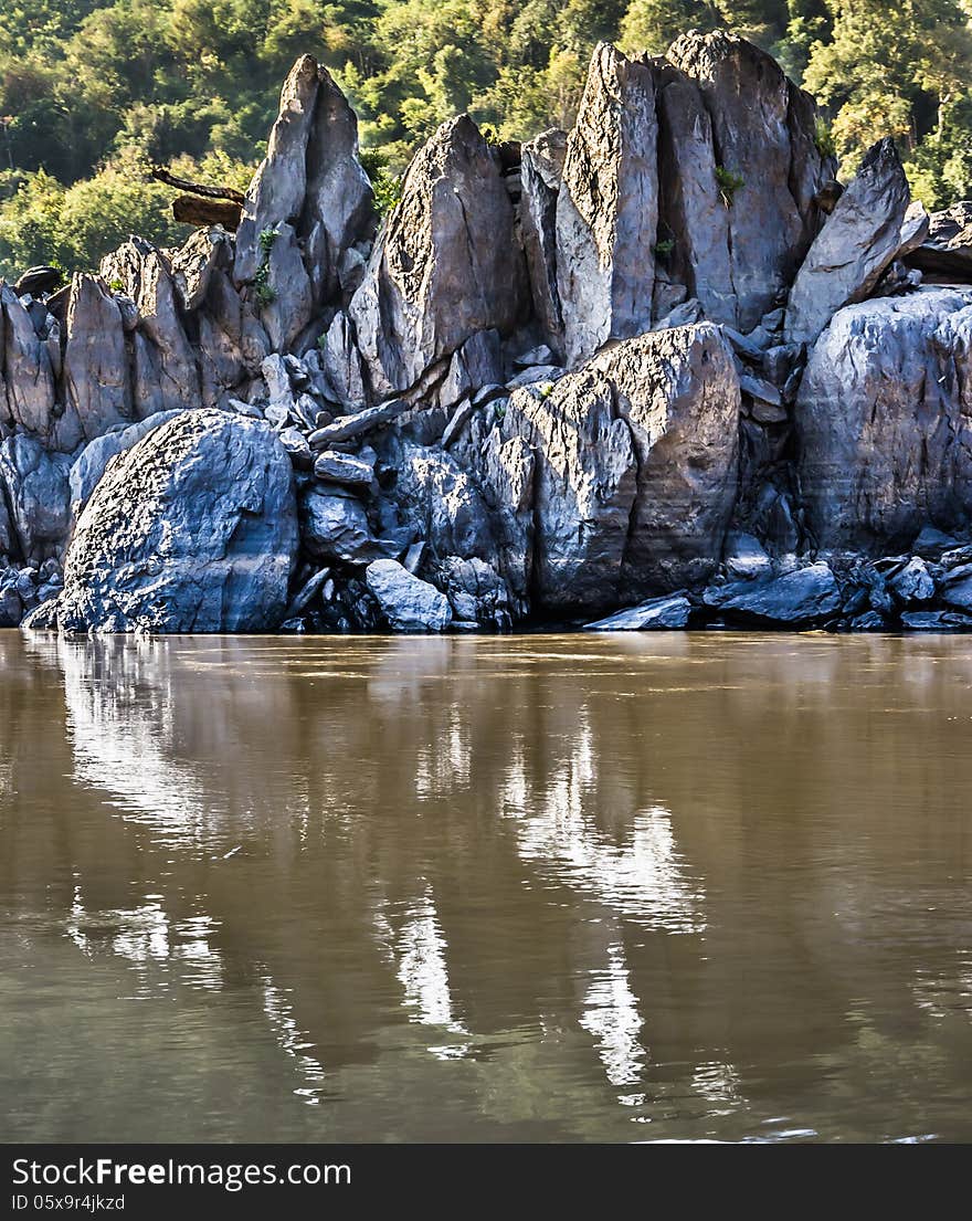 Rocks reflections on Mekong River