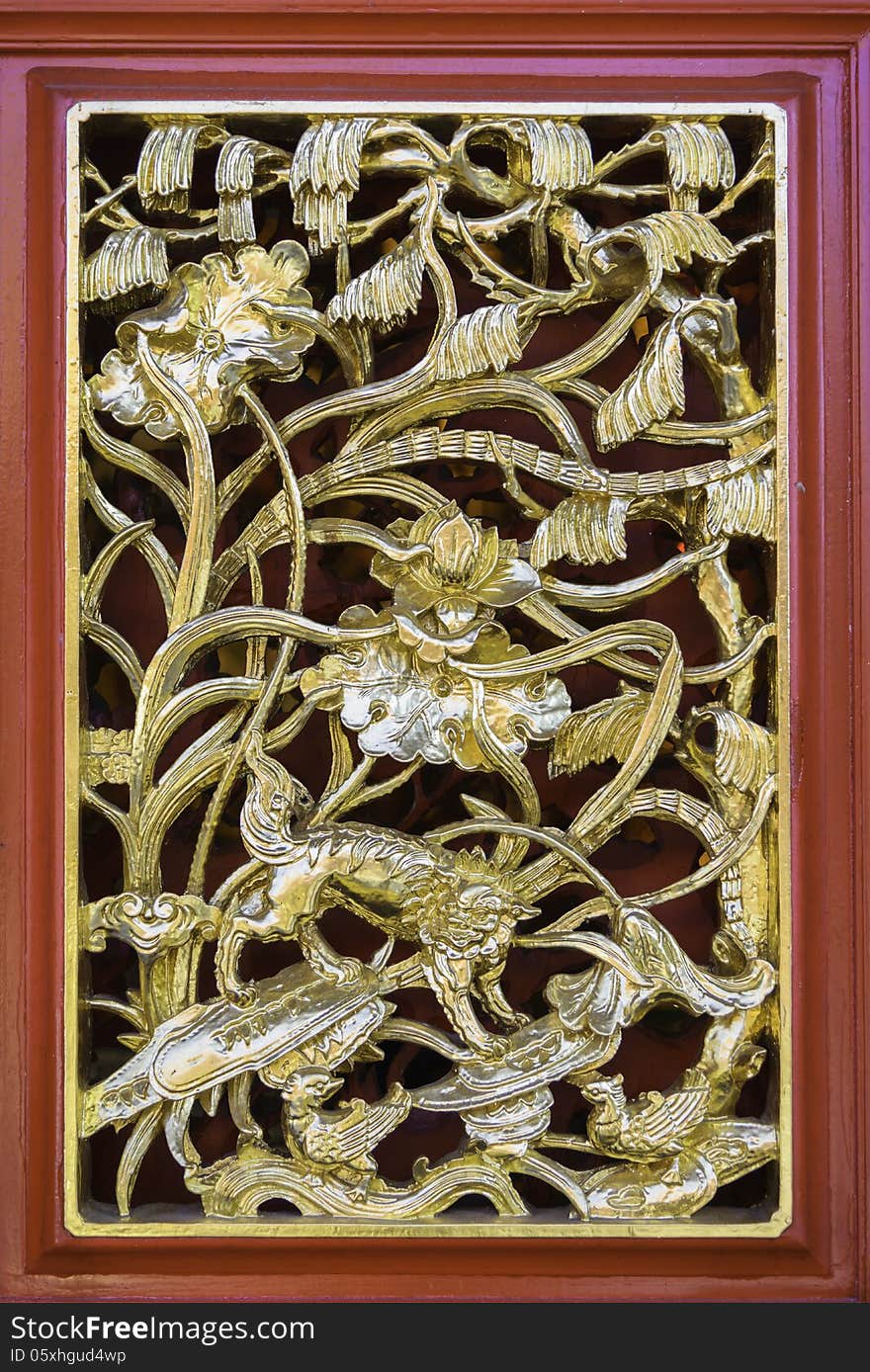 Traditional ancient chinese decorative wood craft with gold leaf window frame. Traditional ancient chinese decorative wood craft with gold leaf window frame