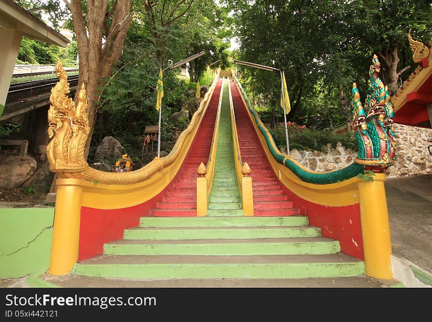 Stairs to the temple with naga sculpture along the sides. Stairs to the temple with naga sculpture along the sides