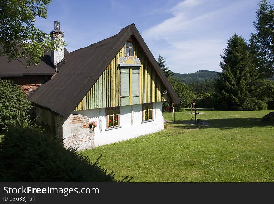 Older cottage with fallen plaster