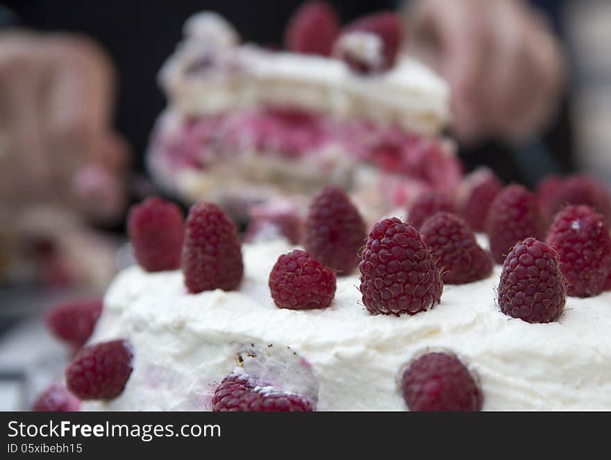 Enjoying a home-made raspberry cake. Enjoying a home-made raspberry cake.