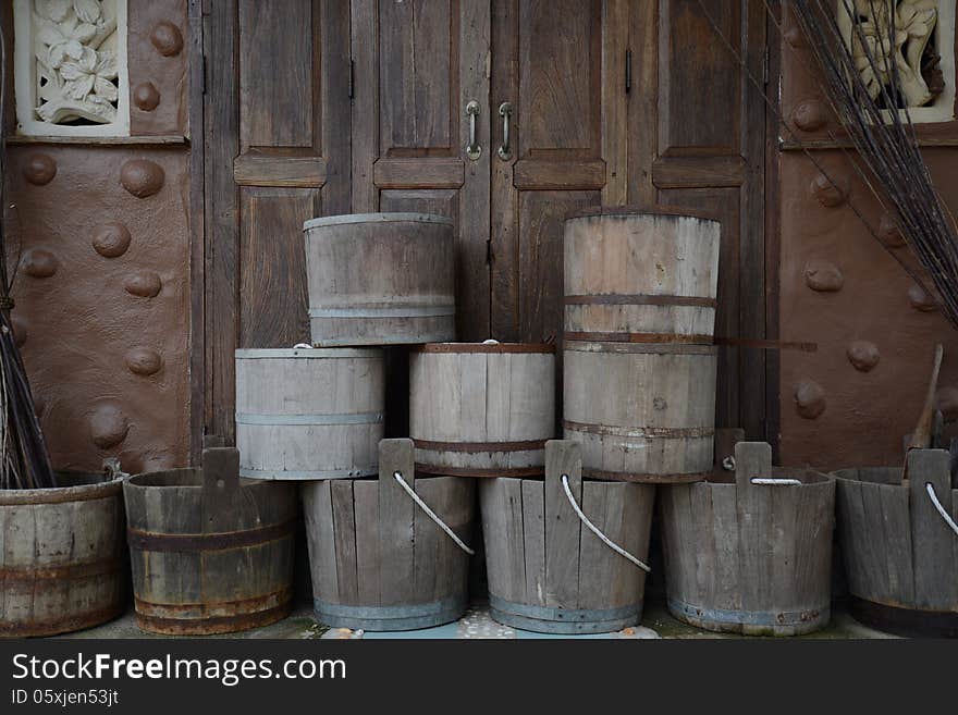 A wooden pail in the old home of the country in thailand.