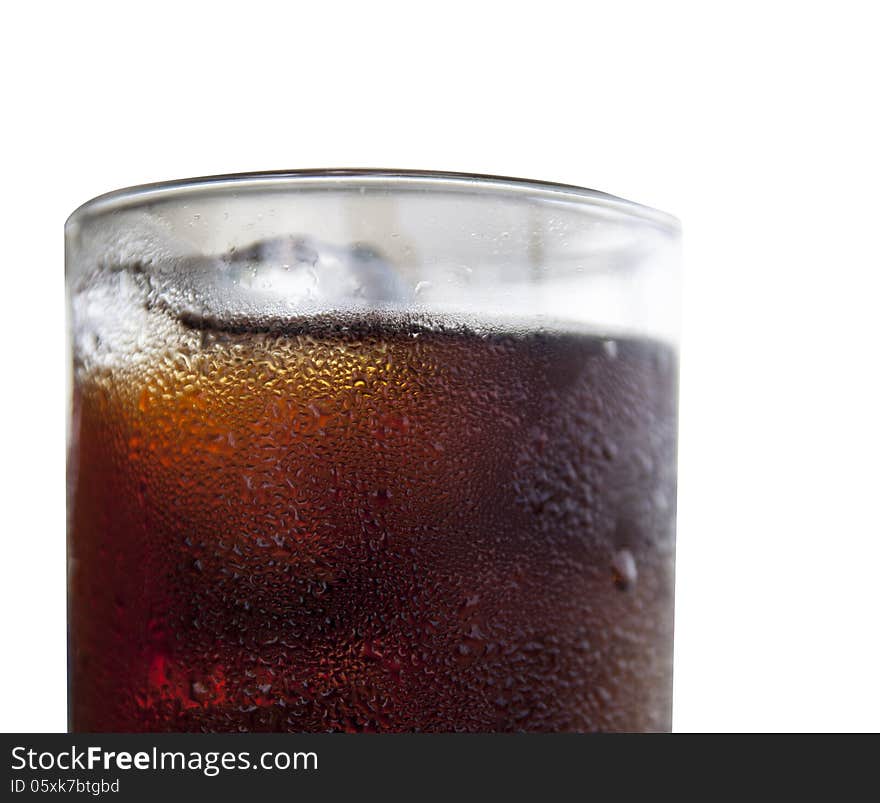 Soft drink with ice in glass