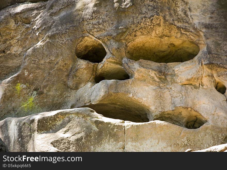 Rock in the shape of the head. Rock in the shape of the head