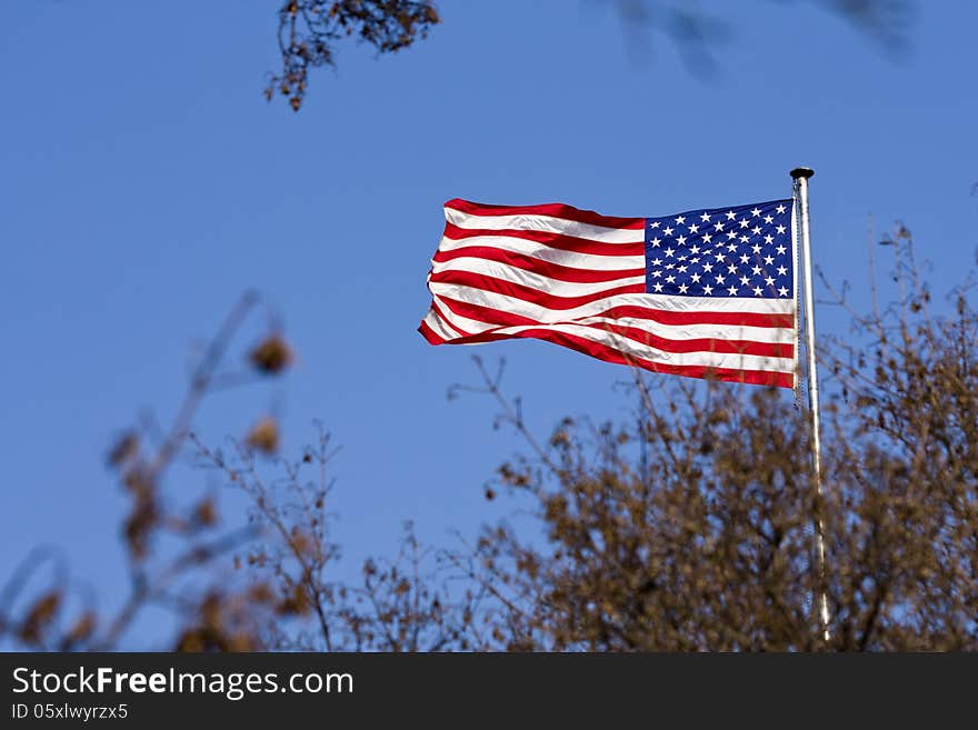 American flag on a background of blue sky