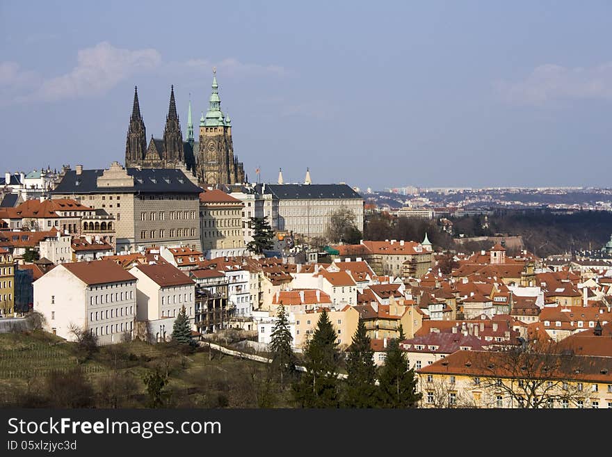 Red roofs of prague and prague castle