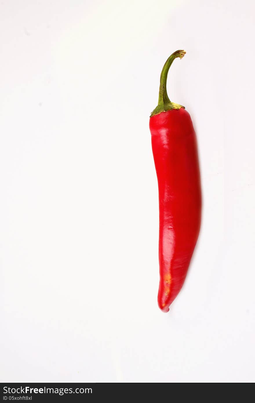 Red hot peppers on white background