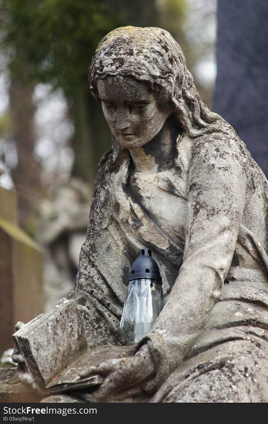 Statue Of Women On Tomb