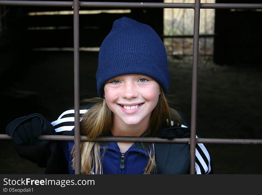 Smiling young girl in old building