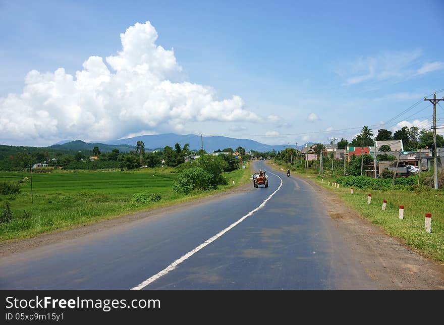 Farm vehicle on the highway