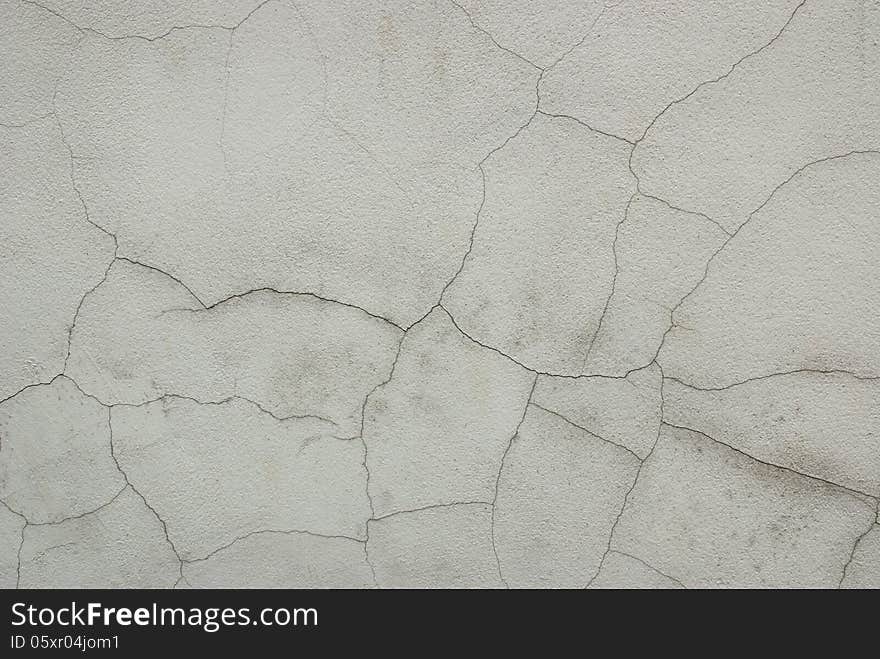 Detail of cracked grunge white wall. Detail of cracked grunge white wall