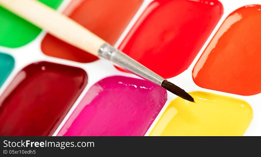 School box of paints and brush macro