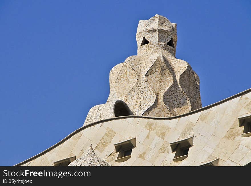 The phantoms sculpture on the roof of La Pedrera Building from Antoni Gaudi architect. Passeig de Gracia, downtown Barcelona, Catalunia, Spain. The phantoms sculpture on the roof of La Pedrera Building from Antoni Gaudi architect. Passeig de Gracia, downtown Barcelona, Catalunia, Spain.