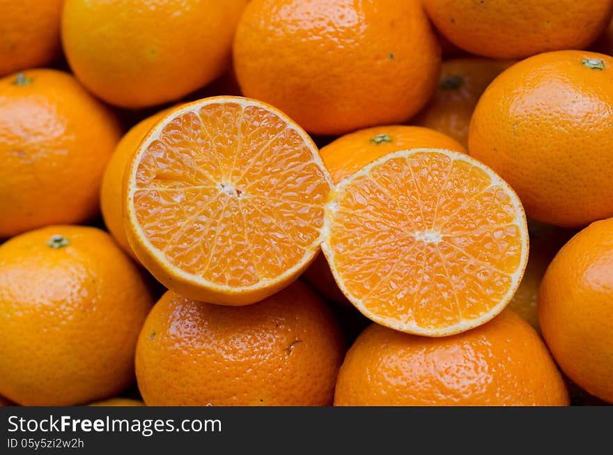 Juicy orange fruits for fresh orange juice. Juicy orange fruits for fresh orange juice