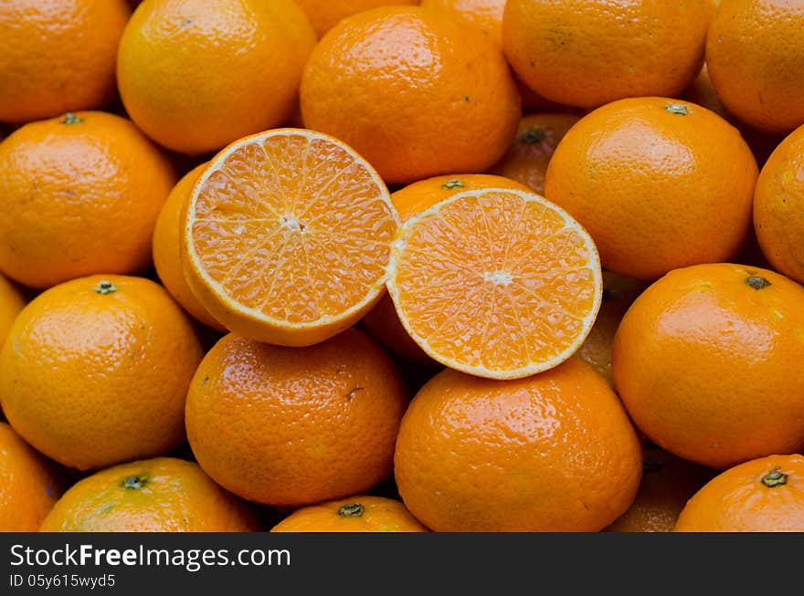 Juicy orange fruits for fresh orange juice. Juicy orange fruits for fresh orange juice