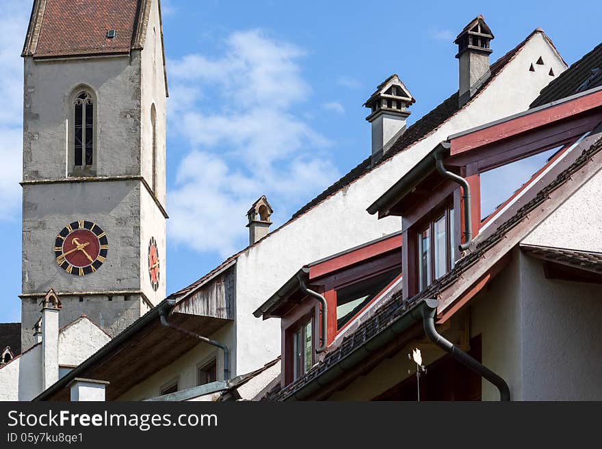 Church tower, chimneys and roofs