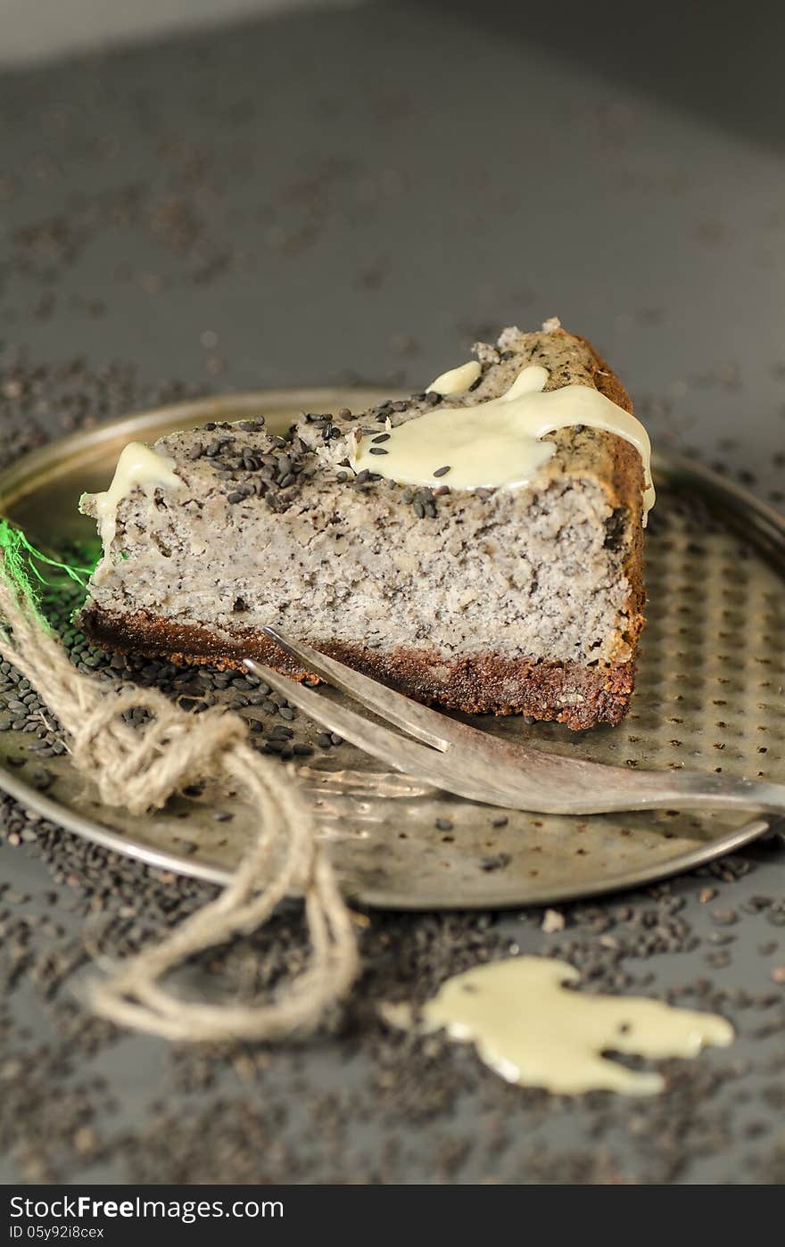 Cheesecake with black sesame seeds on Halloween. From the series Cheesecake for the holiday