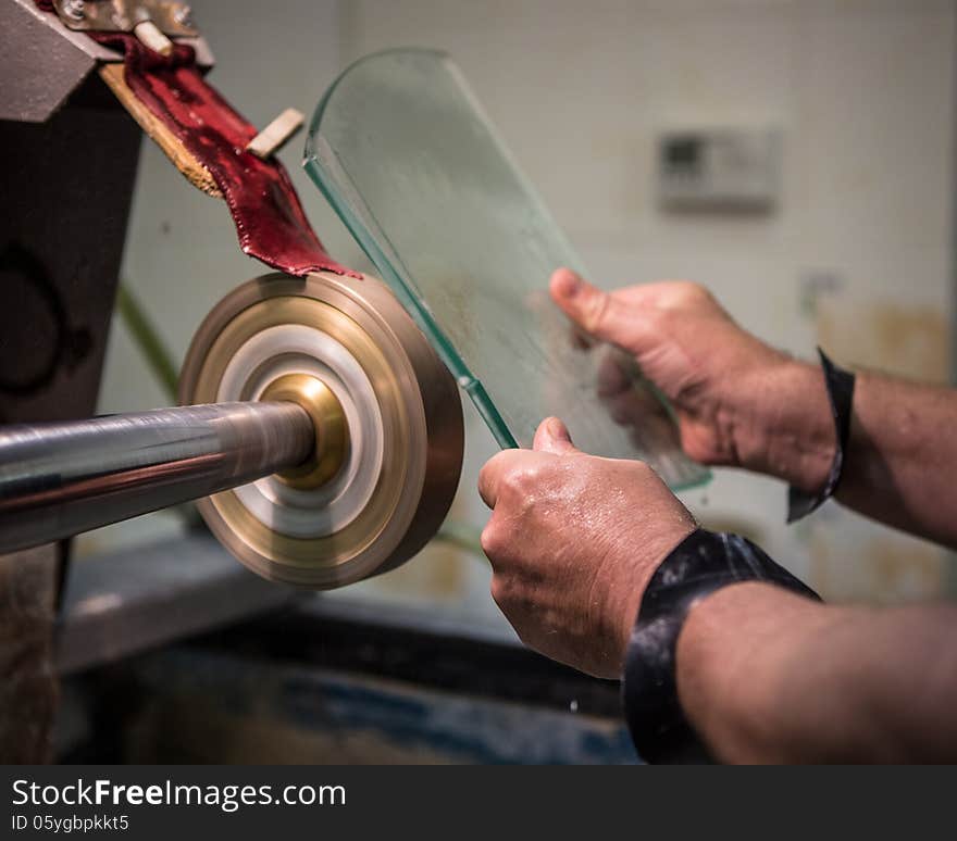 Engraving of glass in the factory.