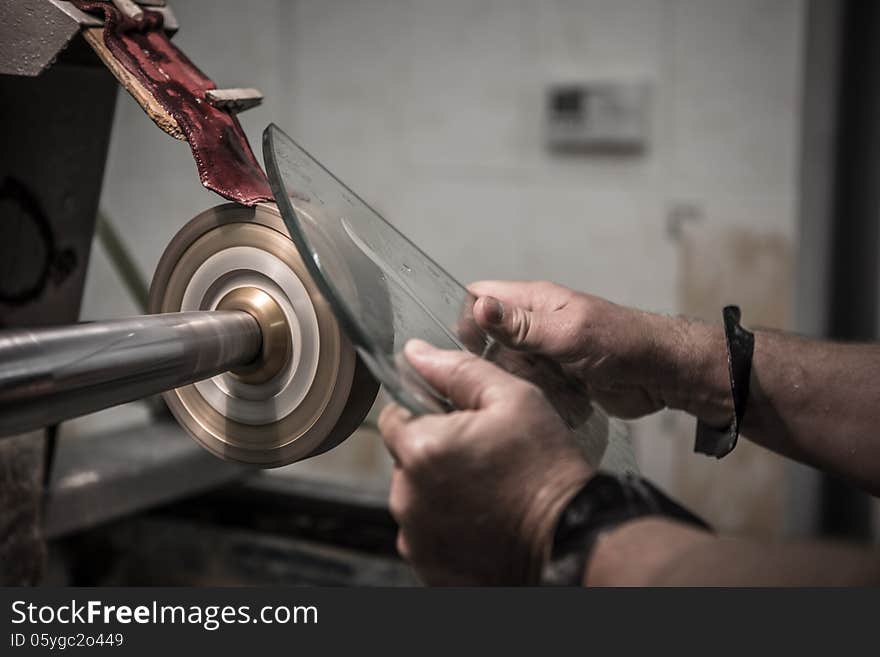 Engraving of glass in the factory.