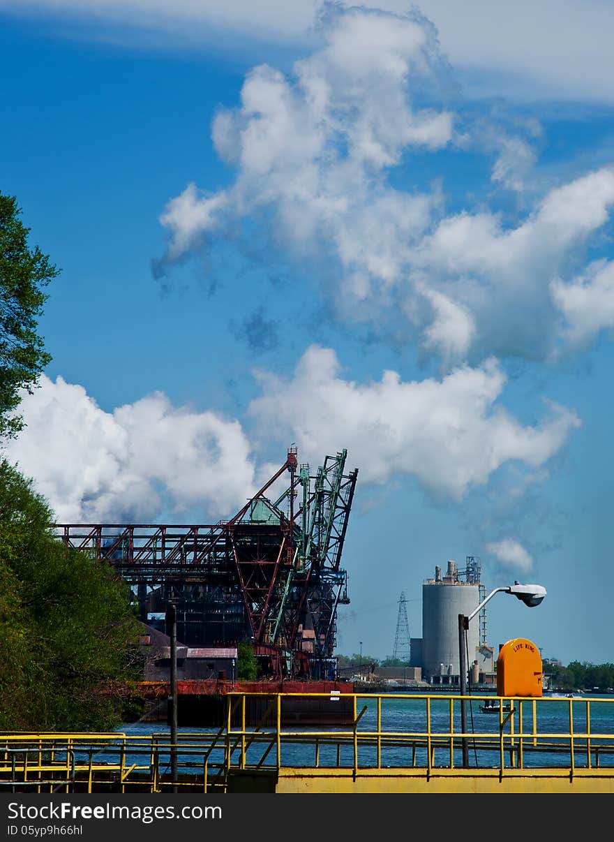 Steel mill boat dock cranes on Detroit river. Steel mill boat dock cranes on Detroit river