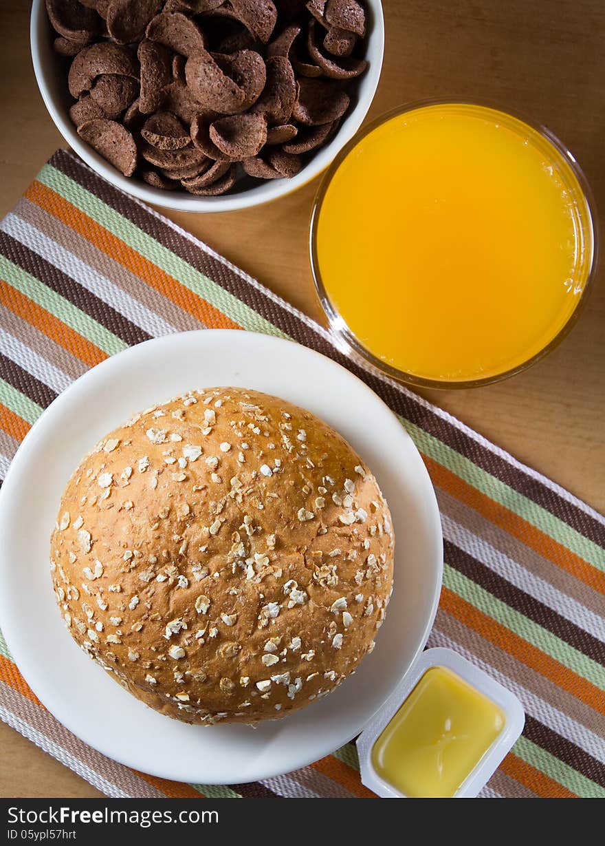 Breakfast set cornflakes and oat bread.