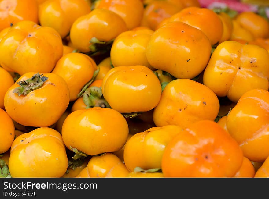 Persimmon fruit in local market, Thailand. Persimmon fruit in local market, Thailand