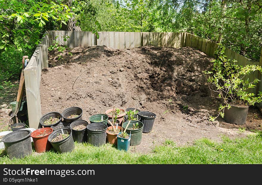 Compost bin with plant pots