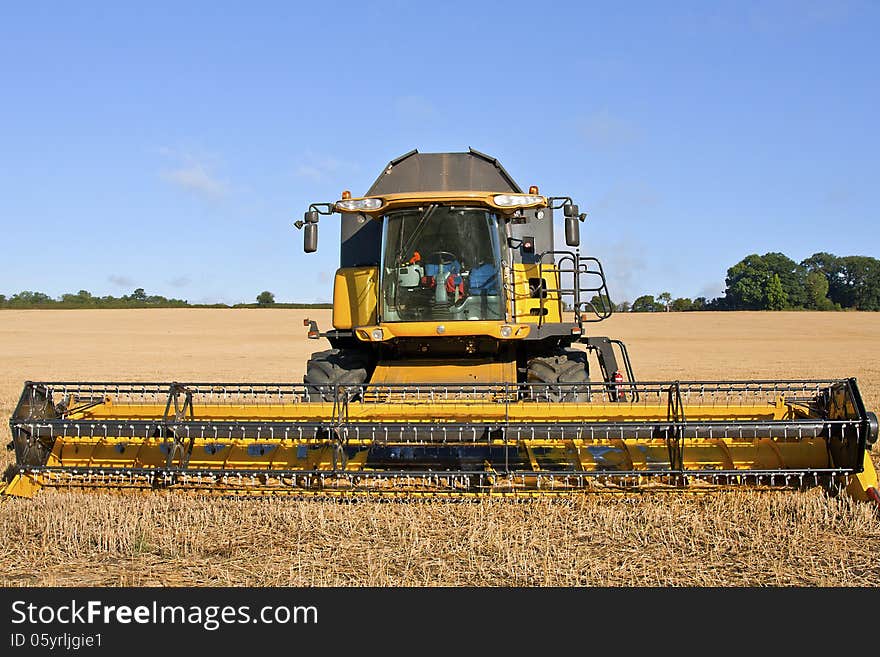 Image of a combine harvester. Image of a combine harvester