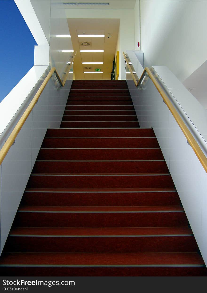 Red stairs in modern bulding. University of Veterinary and Pharmaceutical Sciences. Red stairs in modern bulding. University of Veterinary and Pharmaceutical Sciences