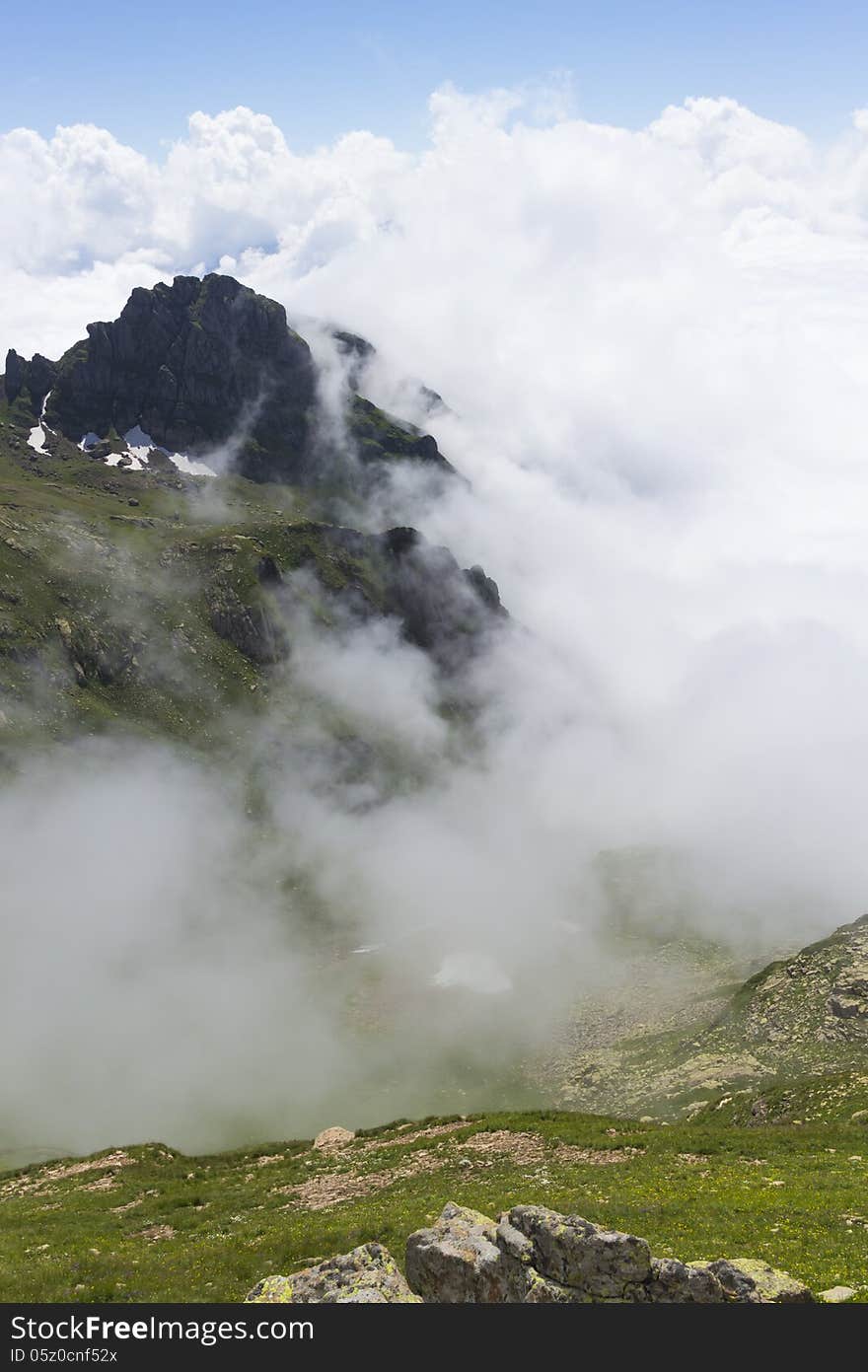 Mountains, blue sky and clouds