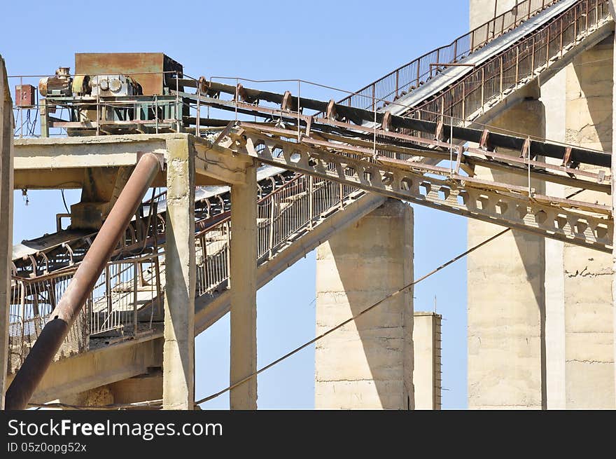 Belt conveyor transporting chalk taken from chalk stone pit to Danube shore, to be loaded into barges. Belt conveyor transporting chalk taken from chalk stone pit to Danube shore, to be loaded into barges.