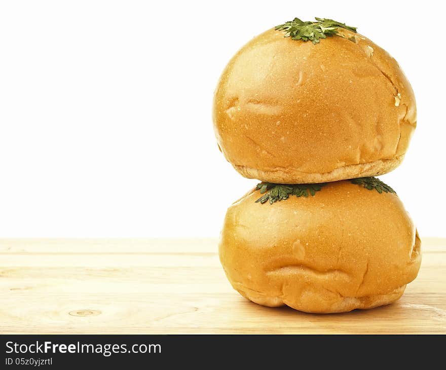 Stack of double shred chicken mayo bread on wood floor in white background. Stack of double shred chicken mayo bread on wood floor in white background