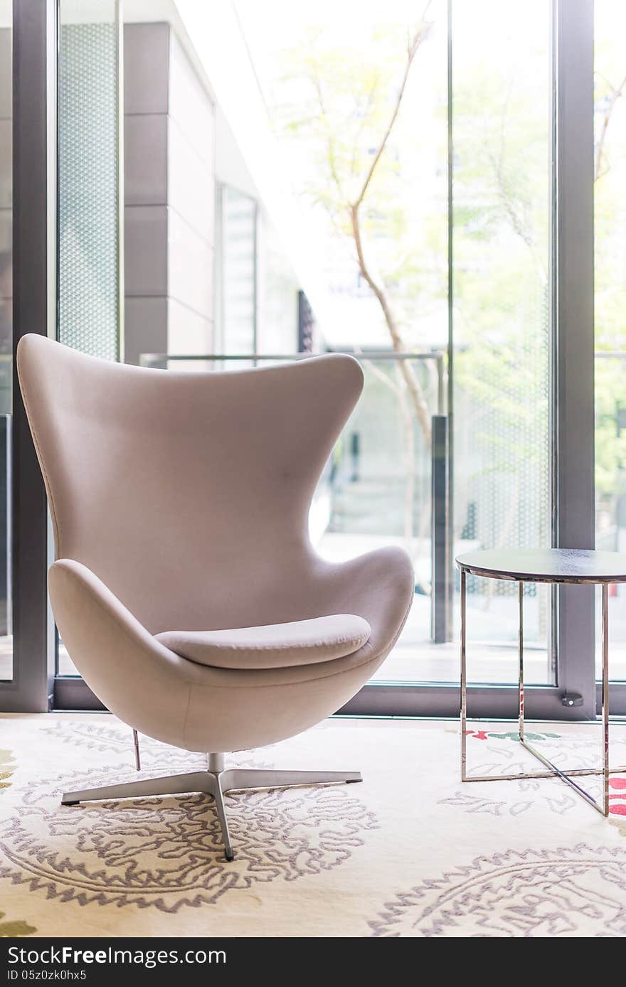 White modern arm chair in living room