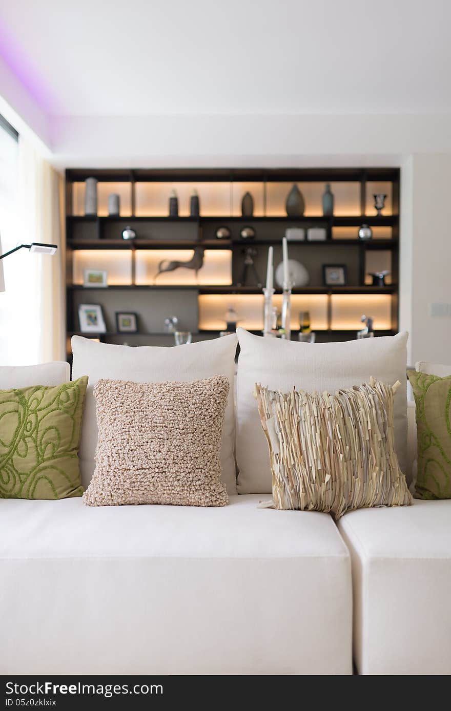 Modern style sofa with pillows