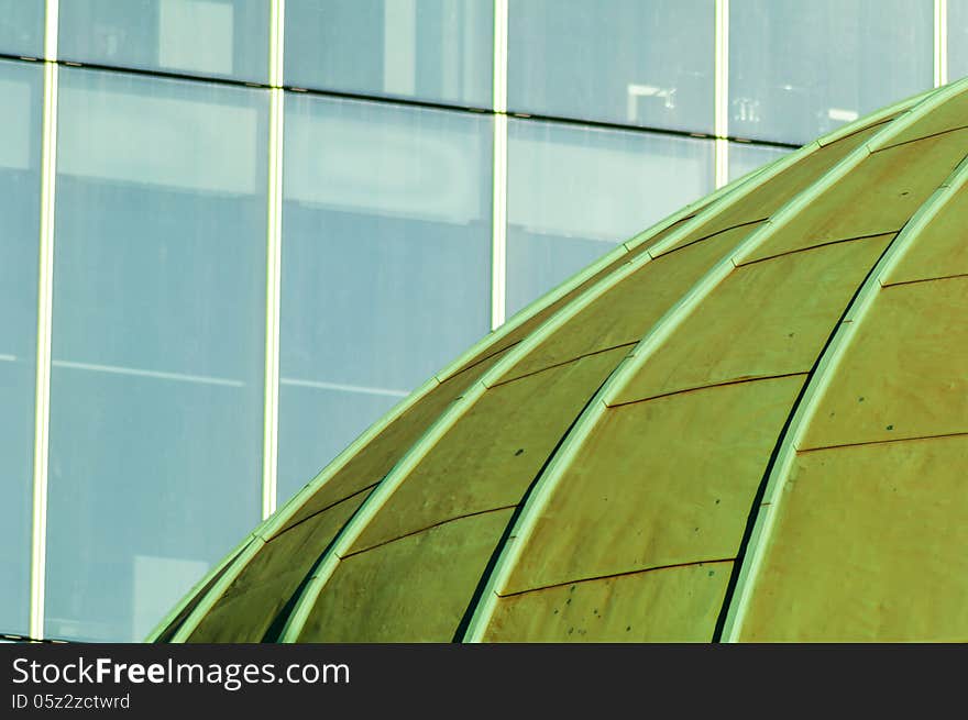 Green Copper Dome of Church with Windows of Office Block. Green Copper Dome of Church with Windows of Office Block