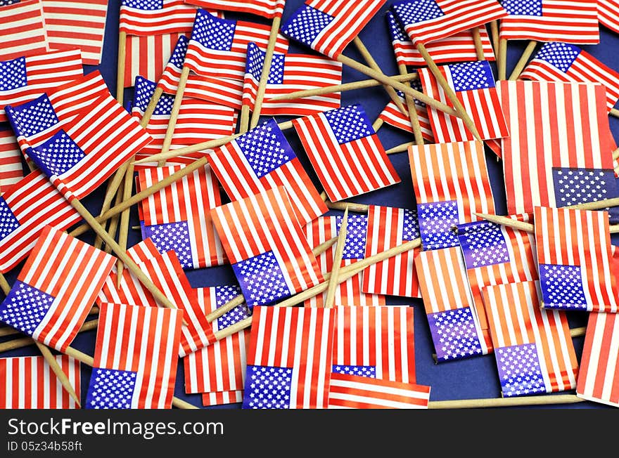 Abstract background of USA Stars and Stripes, red white and blue national toothpick flags for national emblem or public holiday event.