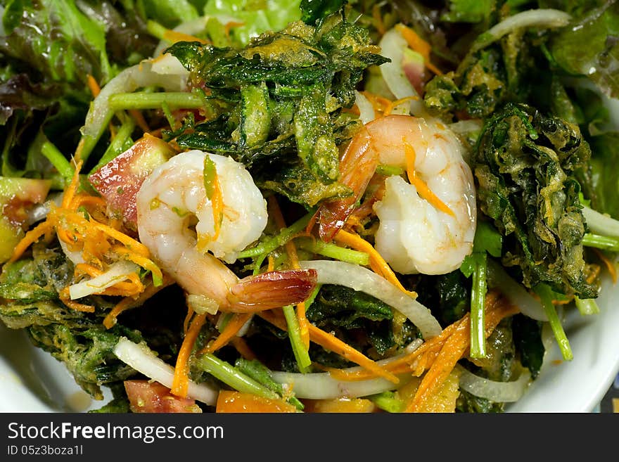 Deep fried Sauropus abicans shrimp salad in thai style