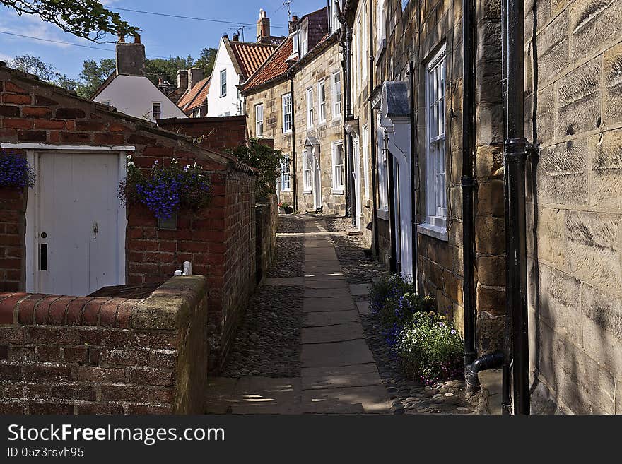 Cobbled alley and street scene Robin Hoods Bay