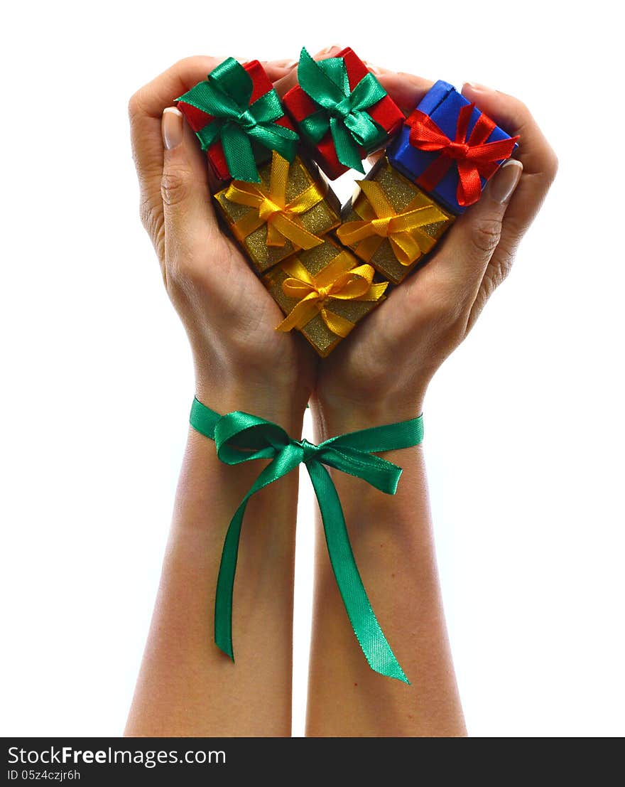 Hans with heap of colorful gifts and green bow isolated. Hans with heap of colorful gifts and green bow isolated