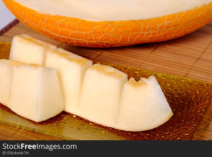 Melon slices on a square plate