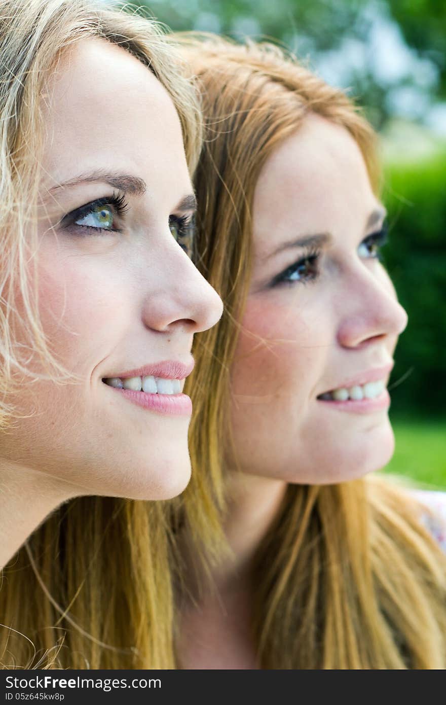 Portrait of young Adult Sisters at the park