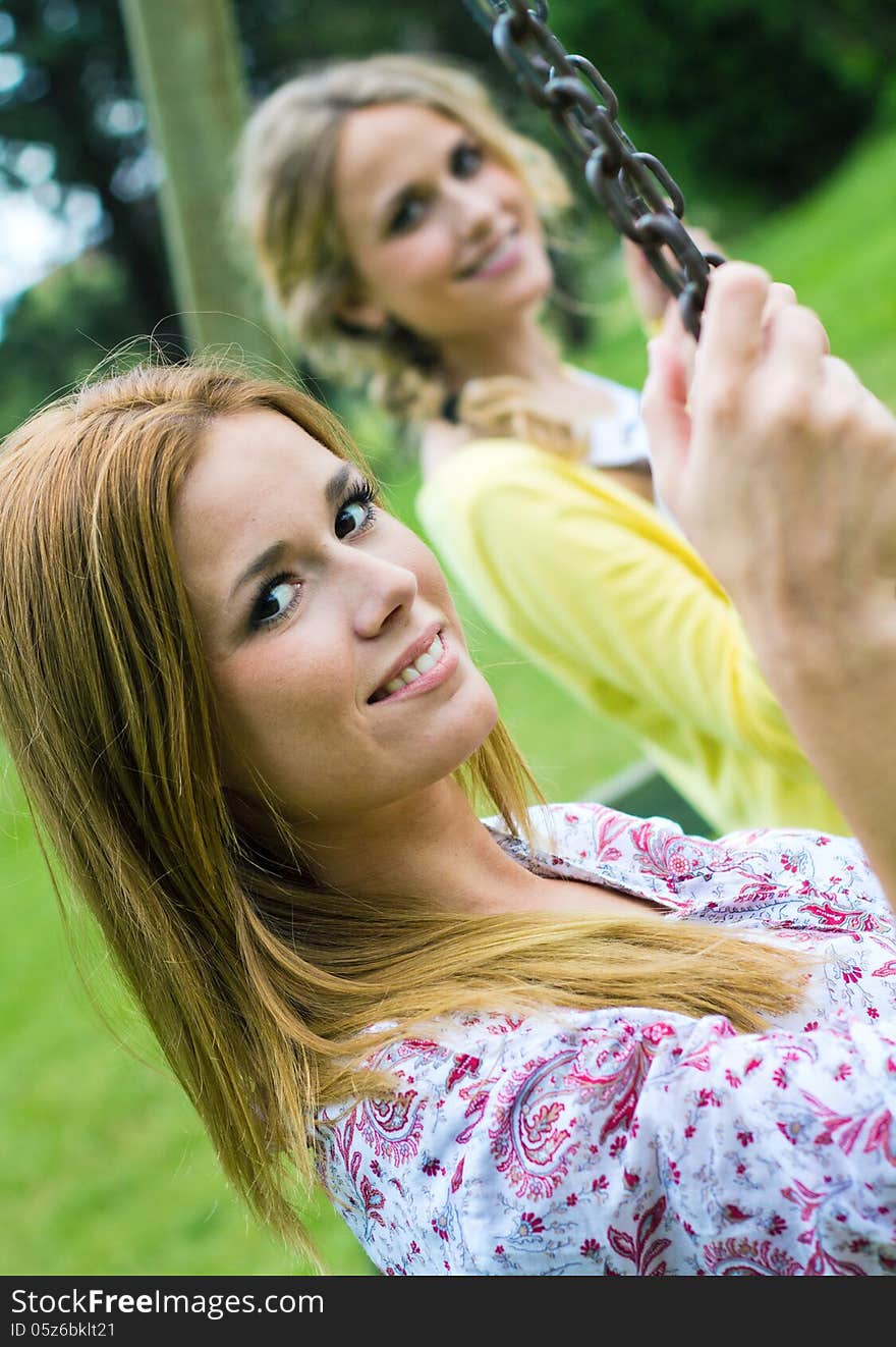 Young Adult Sisters At The Park