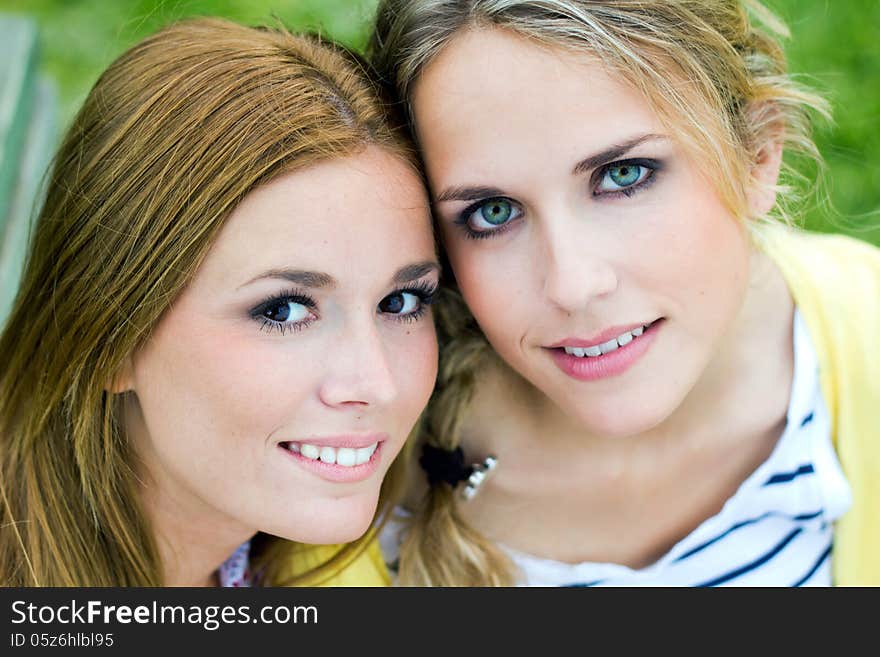 Young Adult Sisters At The Park