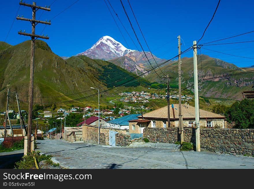 Mountain Kazbek and village Stepantsminda in Georgia. Mountain Kazbek and village Stepantsminda in Georgia